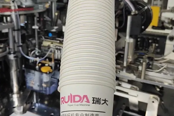 Finished cup collection system for paper cup machine