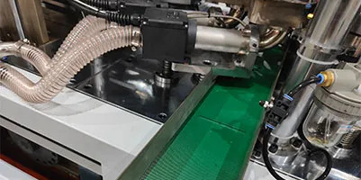 Waste paper discharge system for paper bowl production